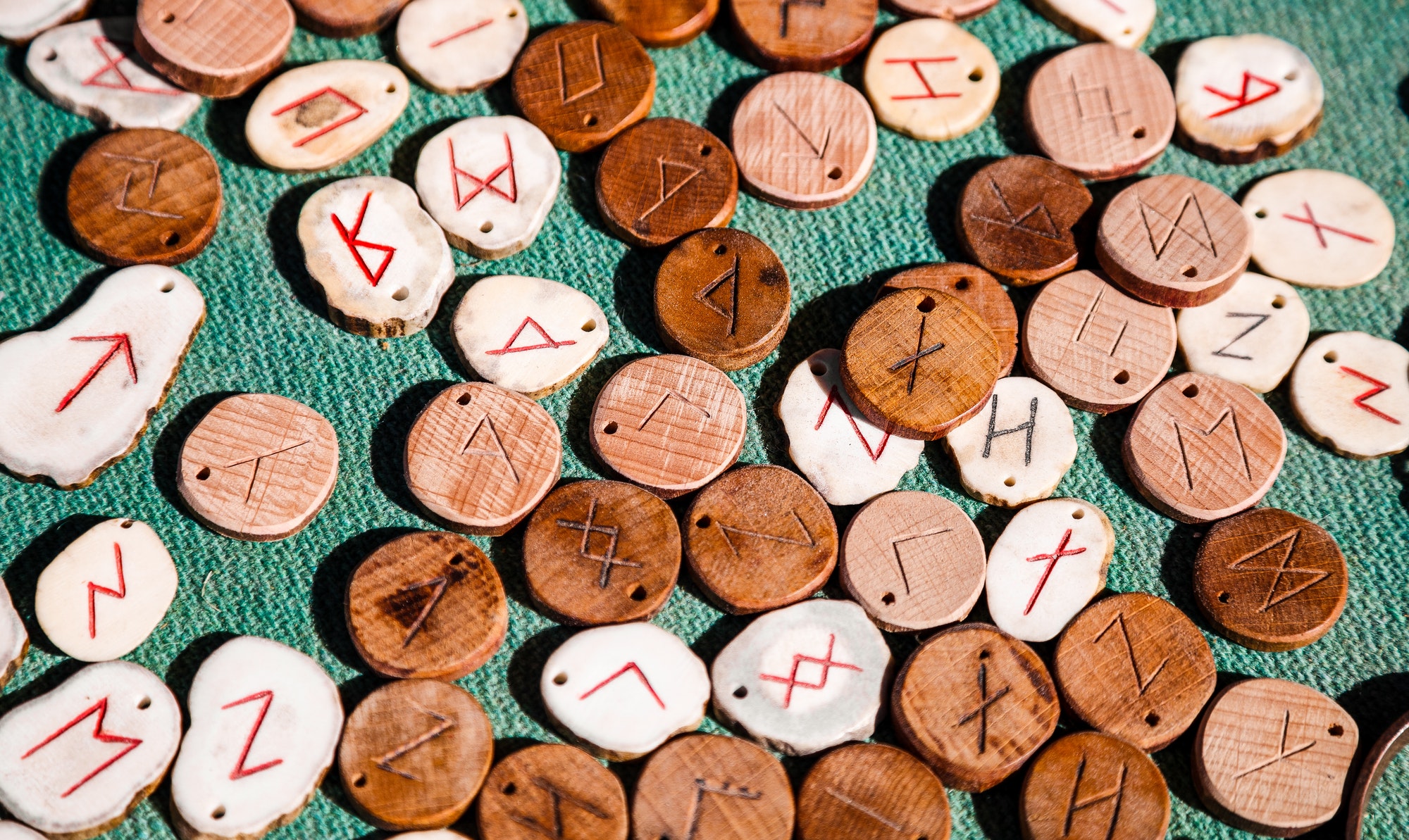 Wooden runes on a green background
